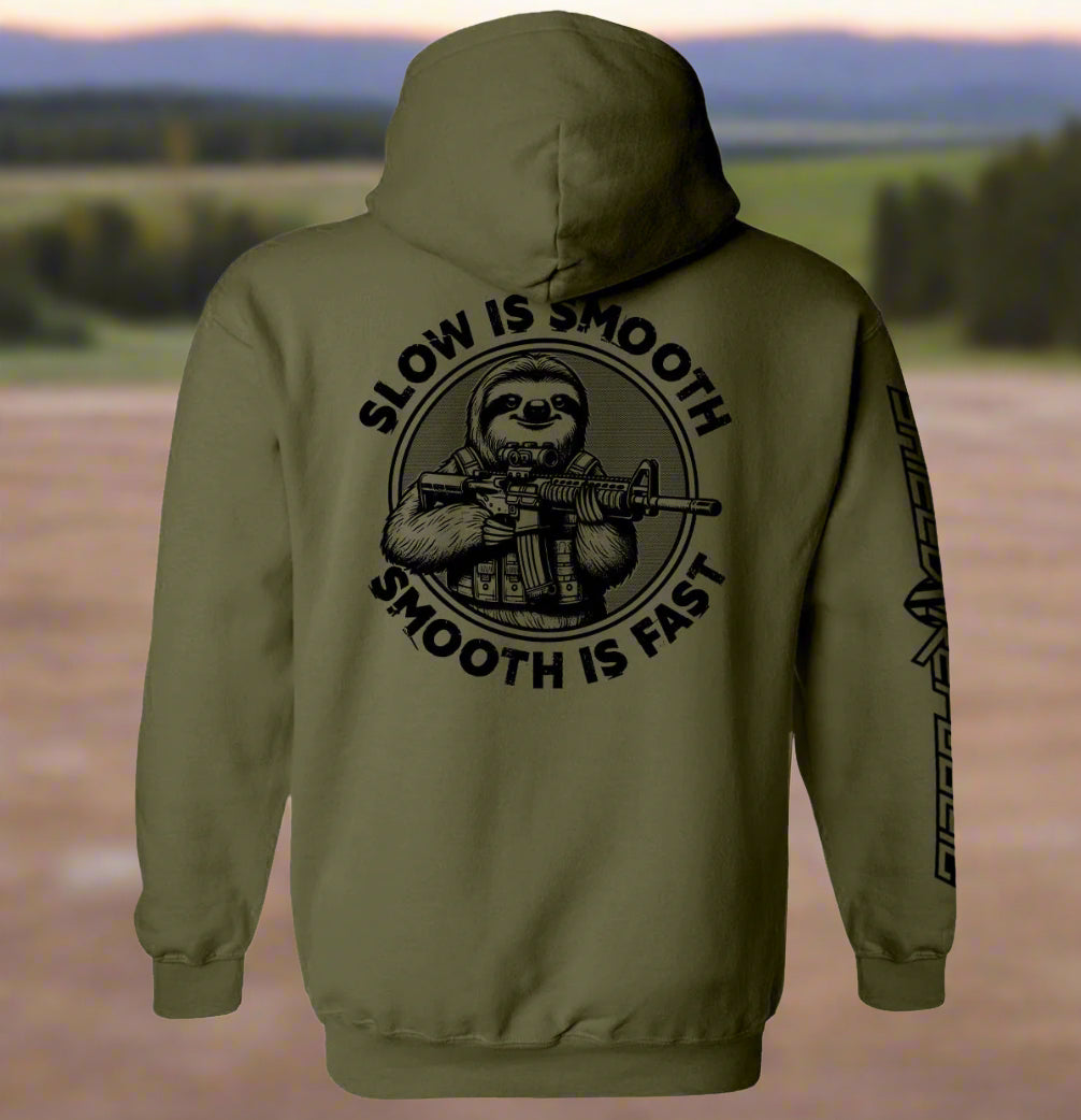 Green hoodie with a graphic of a sloth holding a rifle and text 'Slow is Smooth, Smooth is Fast' on the back.
