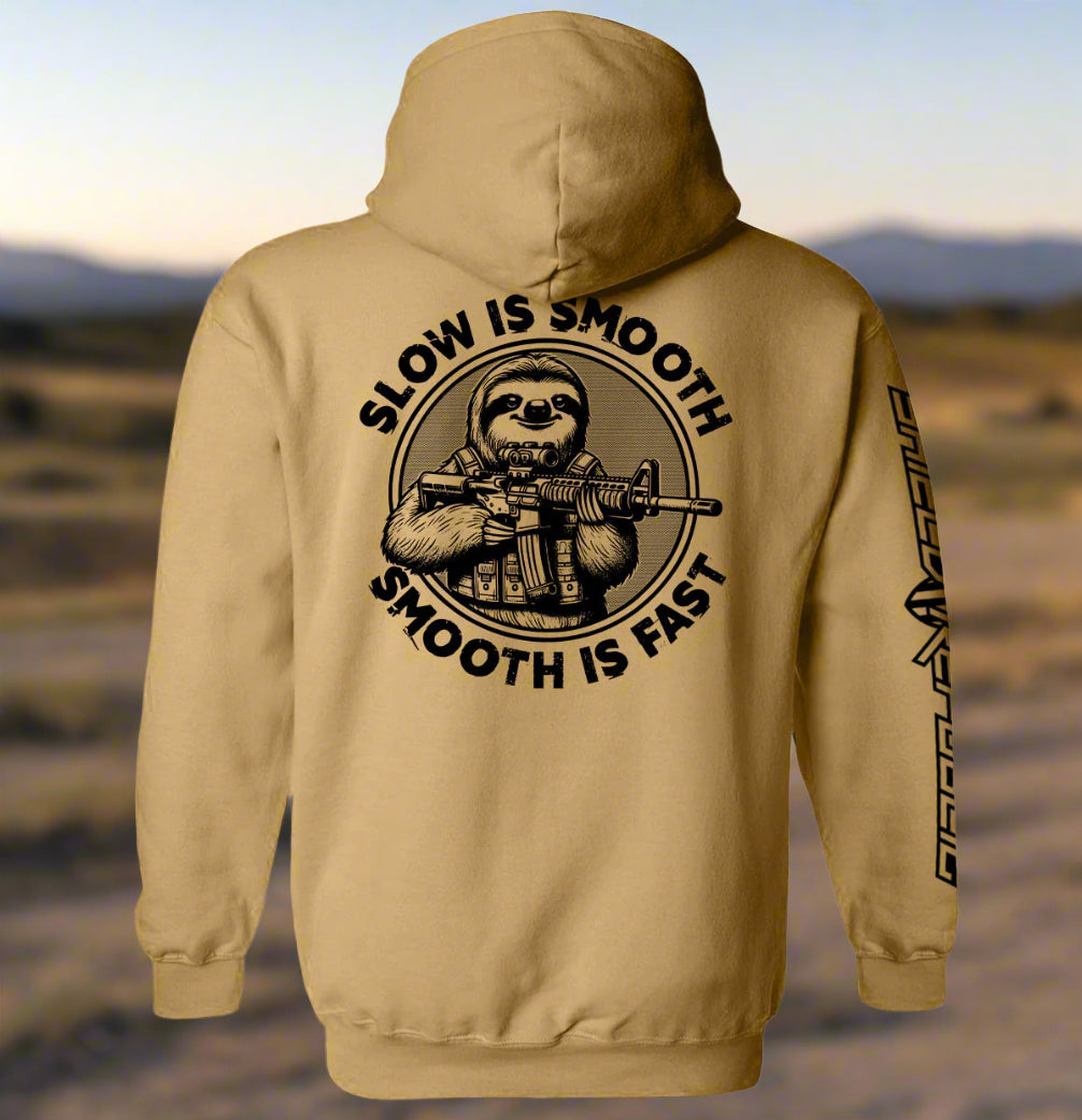 Beige hoodie with a graphic of a sloth holding a rifle and text 'Slow is Smooth, Smooth is Fast' on the back.